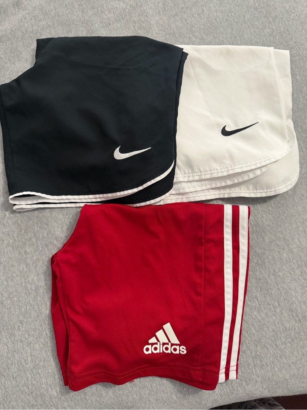 3 Stack - Nike Black and White Athletic/Soccer Shorts and Adidas Red shorts